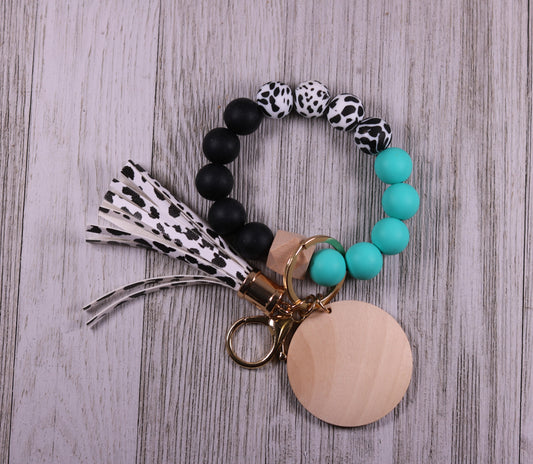 Black cow with turquoise and black (6)
